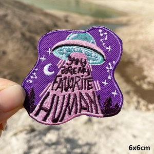 Detailed embroidery of a 6x6cm UFO patch with You Are My Favorite Human text