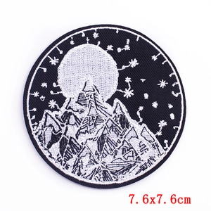 Macro view of 7.6x7.6cm Mount Fuji embroidery patch showing dense moon and star stitching