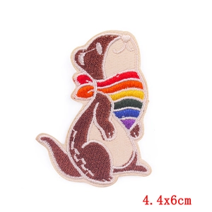 Detail of cartoon rainbow otter embroidery patch showing texture and 4.4x6cm size