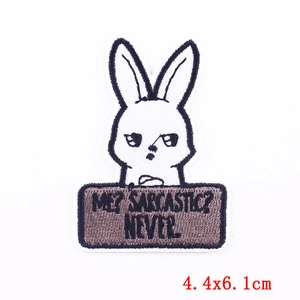 Detailed embroidery patch showing a white cartoon rabbit with sarcasm quote and black border