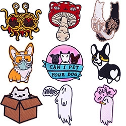 Detailed macro view showing a 9-piece set of cartoon embroidery iron-on patches