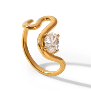 Detail view of wavy gold stainless steel ring with oval clear zircon stone