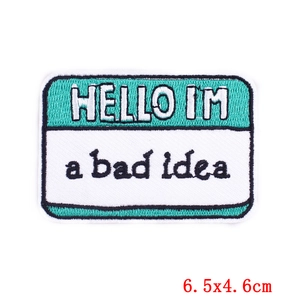 Embroidered Hello I'm a bad idea patch in mint green and white with black border