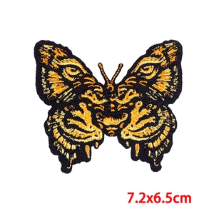 Butterfly embroidered iron-on patch with eye pattern and tiger texture, 7.2x6.5cm size