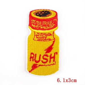 Close-up of RUSH bottle embroidery patch with detailed red and yellow stitching, 6.1x3cm