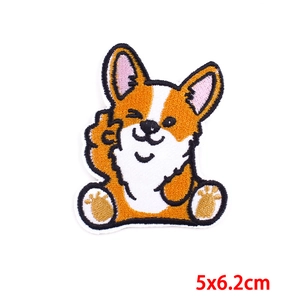 Cartoon Corgi embroidery patch with adhesive backing for DIY clothing decor, 5x6.2cm size