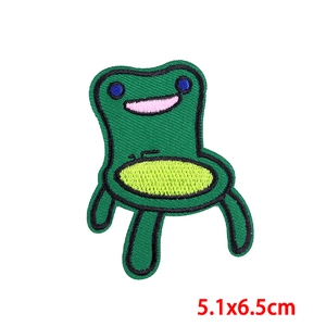 Detailed view of frog chair embroidered patch with 5.1x6.5cm dimensions and fine stitching