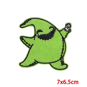 Detail shot of Oogie Boogie embroidered patch with dice and size info 7x6.5cm
