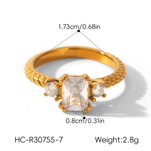 Detailed view of the 0.8cm rectangular zircon on a gold-plated twisted band.