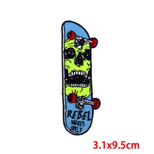 Detail of Rebel Skates Only embroidered skateboard patch with dimensions 3.1x9.5cm