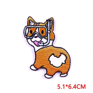 Close-up of a diving corgi embroidery patch with scuba mask and detailed dimensions