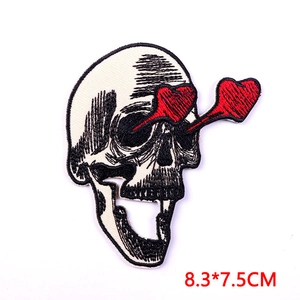 Skull and heart embroidered patch for punk apparel, white background, size 8.3x7.5cm