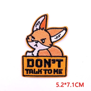 Detail of fox patch with 'DON'T TALK TO ME' embroidery, 5.2x7.1cm size macro view