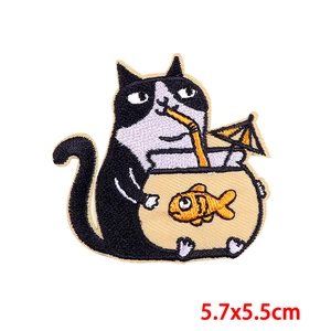 Detail of cartoon cat embroidery patch with dimensions 5.7x5.5cm for clothing repair