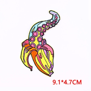 Detailed view of colorful banana octopus embroidery patch measuring 9.1x4.7 cm