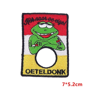Detail of Oeteldonk frog patch with red white yellow stripes and custom embroidery