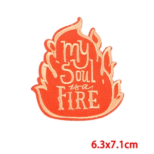 Detailed embroidery patch featuring flame shape with My Soul Is A Fire text design