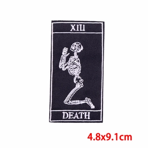 Tarot Death card XIII embroidered patch featuring a white skeleton on black background