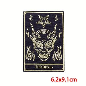 Close-up of The Devil tarot embroidery patch featuring a skull with horns and star