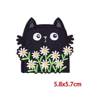 Cartoon black cat embroidery patch with white daisies and measurement 5.8x5.7cm