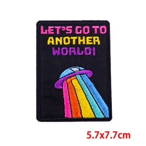 Close-up of UFO embroidery patch with colorful lettering and detailed stitching