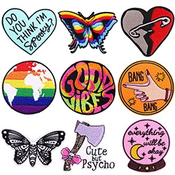 Detailed view of nine assorted embroidered patches with various unique punk designs