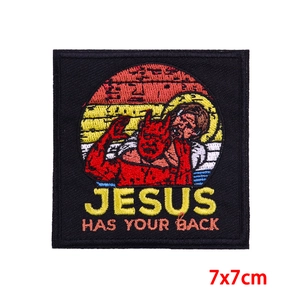 Close-up of Jesus and devil embroidery patch with Jesus Has Your Back text 7x7cm