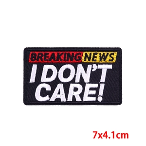 Embroidered Breaking News I Don't Care patch for DIY apparel and bags, size 7x4.1cm