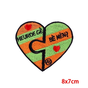 Embroidered heart-shaped orange and green striped patch with Dutch text 8x7cm