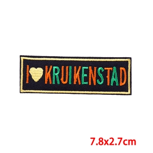 Embroidered I Heart Kruikenstad patch with black background and gold border 7.8x2.7cm