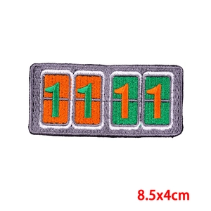 Detail of embroidered Kruikenstad patch featuring 1111 numbers with high-quality texture