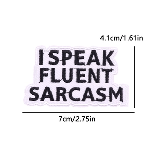 Detailed view of embroidery patch with I Speak Fluent Sarcasm text and size measurements