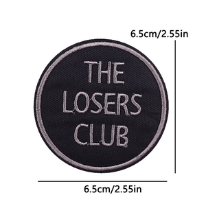 6.5cm The Losers Club round embroidered patch with black twill base and silver lettering