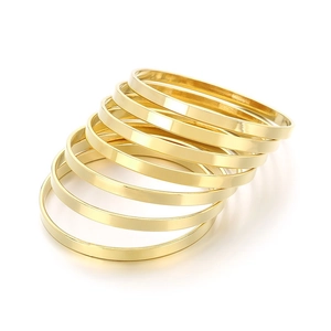 Minimalist stackable gold plated stainless steel bangles for women, set of seven