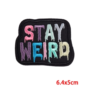 6.4x5cm Stay Weird embroidered patch with colorful dripping letters on black fabric