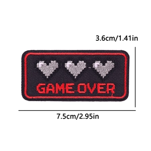 Detail view of Game Over embroidered patch with pixel hearts and red border finish