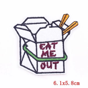 Detail of embroidered Chinese takeout box patch with Eat Me Out text, 6.1x5.8cm size