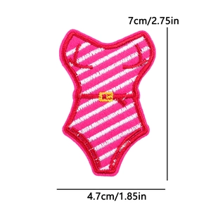 Close-up of pink striped swimsuit embroidery patch with detailed red stitched edges