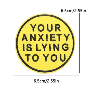 Yellow embroidered patch with Your Anxiety Is Lying To You text and 6.5cm dimensions