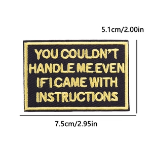 Close-up of black and gold quote embroidery patch with detailed size measurements