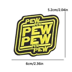 Close-up of Pew Pew embroidered patch with black background and yellow border detail