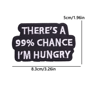 Embroidered black patch with There is a 99% Chance I am Hungry text in 8.3x5cm size