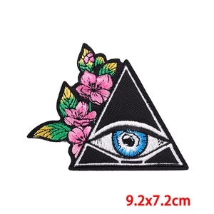 Embroidered evil eye patch with pink cherry blossoms and green leaves, 9.2x7.2cm size