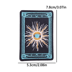 Mystical Tarot sun and eye embroidered patch with blue trim on black felt backing