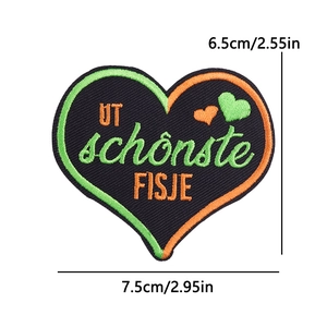 Detail of heart embroidery patch with UT schönste FISJE text, size 7.5cm x 6.5cm