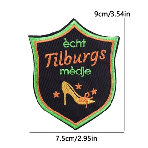 Detail view of Kruikenstad shield patch with high heel and stars embroidery work