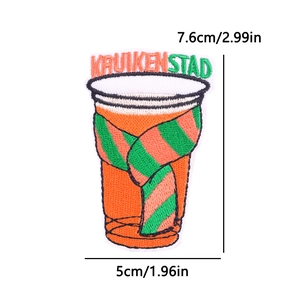 Macro detail of Kruikenstad embroidered patch showing striped scarf and precise dimensions