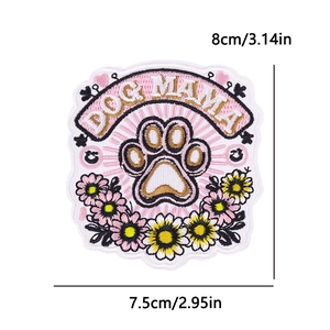 Dog Mama embroidered iron-on patch with pink paw print and flowers, 8x7.5cm size