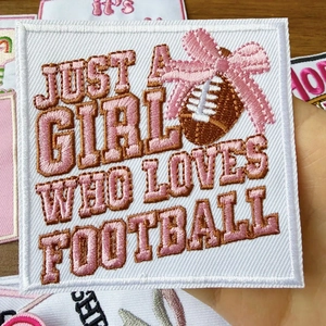 Embroidered football patch with pink bow and Just A Girl Who Loves Football quote