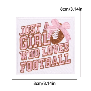 Detail of 8x8cm pink football embroidery patch with ribbon bow and inspirational text